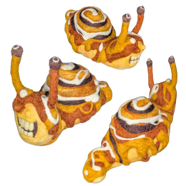 A felted Schnecken dessert snail.